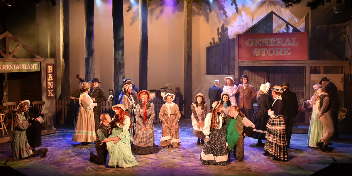 Cast of play on stage